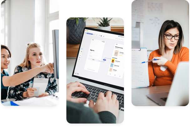 A student pointing at something on her screen to the classmate sitting right by her.