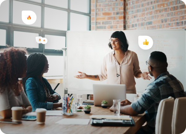 Four colleagues holding a meeting around a table.